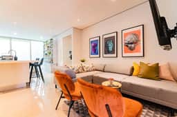Modern Group Condo w/ Private Balcony & Parking - Image 4