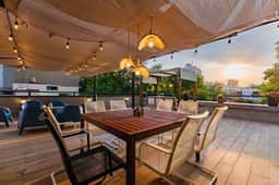 Penthouse w/ Rooftop Swing, City Views & Terrace - Image 5