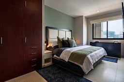Sleek High-Rise with Pool, Gym, Jacuzzi & BBQ Area - Image 2