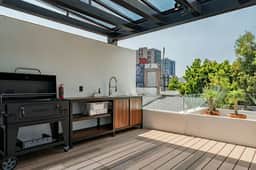 Spacious Group Getaway with Private Terrace & Grill - Image 3