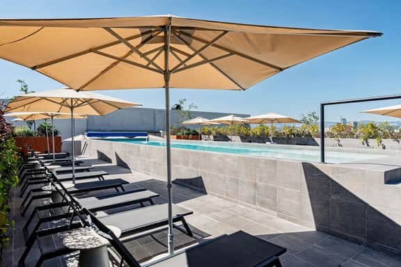 Escape to Skyline Views & Rooftop Pool Bliss - Image 5