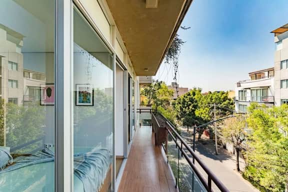 Modern Group Condo w/ Private Balcony & Parking - Image 5