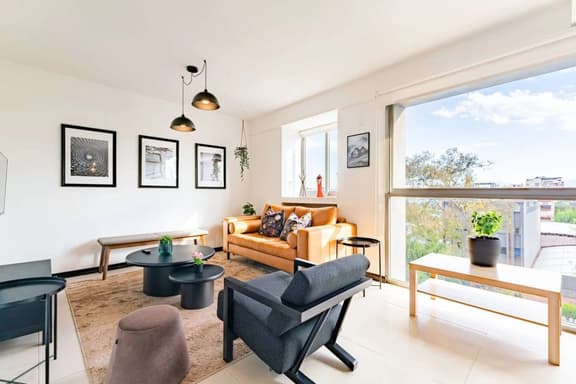 Stylish Condo Near Parks with Smart TV and WiFi - Image 1
